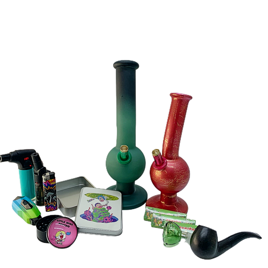 A collection of Executive Color Glass Bongs, a smoking pipe,  vibrant bongs, and some tobacco accessories.